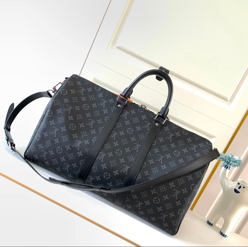 L.V Keepall Bandoulière 55 – Monogram Eclipse