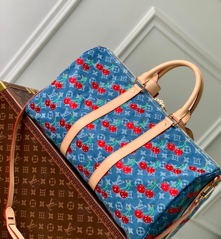 Louis Vuitton Cherry Denim Keepall Bag