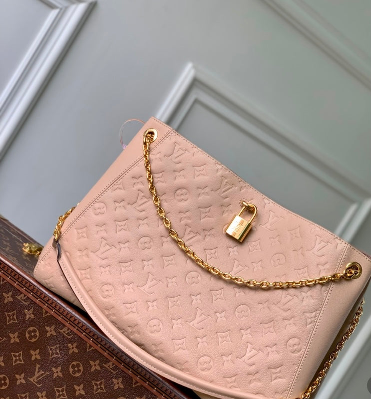 Louis Vuitton Lockme Ever MM – Empreinte Leather in Rose Poudre