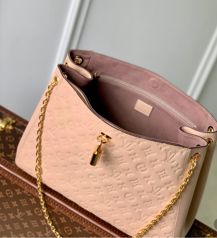 Louis Vuitton Lockme Ever MM – Empreinte Leather in Rose Poudre